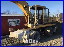 1993 Caterpillar 214BFT Mobile Hydraulic Excavator with Cab