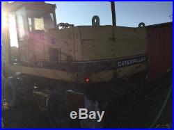 1993 Caterpillar 214BFT Mobile Hydraulic Excavator with Cab