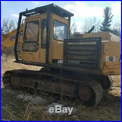 1995 John Deere 590D Excavator, great condition, coupler, hydraulic thumb guards