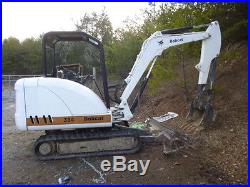 2003 Bobcat 334 with 2 buckets, thumb and trailer