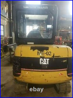 CAT Mini Excavator 302.5 with a 12 dig bucket and 36 grading bucket