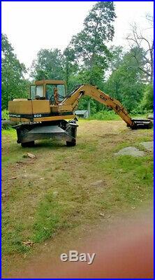 Caterpillar 206 Wheeled Excavator WithHyd. Thumb + 3 buckets