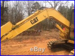 Caterpillar E70B excavator with thumb