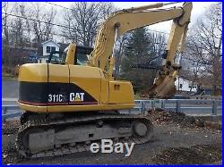 Excavator Cat 311Cu only 2700 hours, 2 buckets and thumb