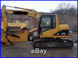 Excavator Cat 311Cu only 2700 hours, 2 buckets and thumb