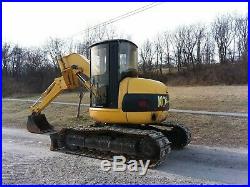 Kobelco Sk75ur Mid-sized Excavator With Blade And Knuckle Boom