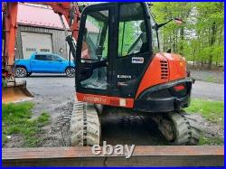 Super low hour kubota kx080-4 with rototilt and multiple attachements